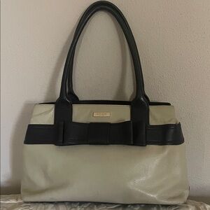Kate Spade Black and Tan Leather  Shoulder Bag.  GUC. zipper pocket inside.